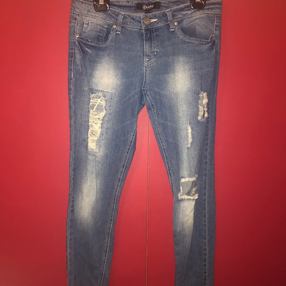 Distressed blue jeans